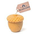 Raw Acorn shaped candle with Bluecorn tag and white background