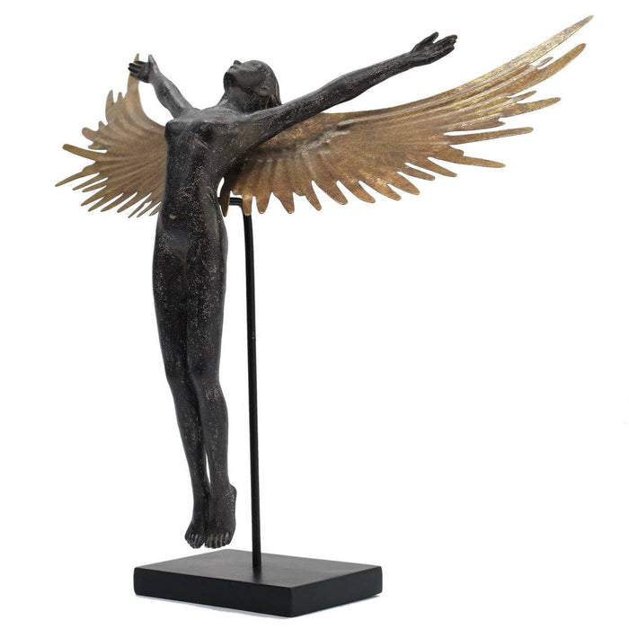 Statue of a winged figure on a white background