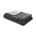 Bicolore Bath Towel in Storm/Silver, folded to show the deep storm-grey terry exterior and contrasting soft silver reverse with light binding.