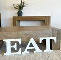 EAT sign letters