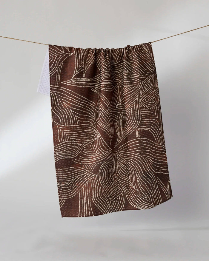 Geometry Pearl Botanical Tea Towel — brown Geoweave™ kitchen towel with white dotted botanical print, 18x30 inches, made from post-consumer recycled materials