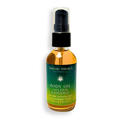 Bottle of Singing Springs Botanicals Body Oil Golden Radiance on a white background