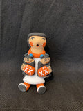 Jemez Handmade Storyteller Mother and 2 Children; Artist Tim Tosa; Approx. 4”H X 2.5”W; ST1-2