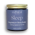 Organic magnesium sleep butter in a 4-ounce amber glass jar with a gold lid and calming nighttime formula label.
