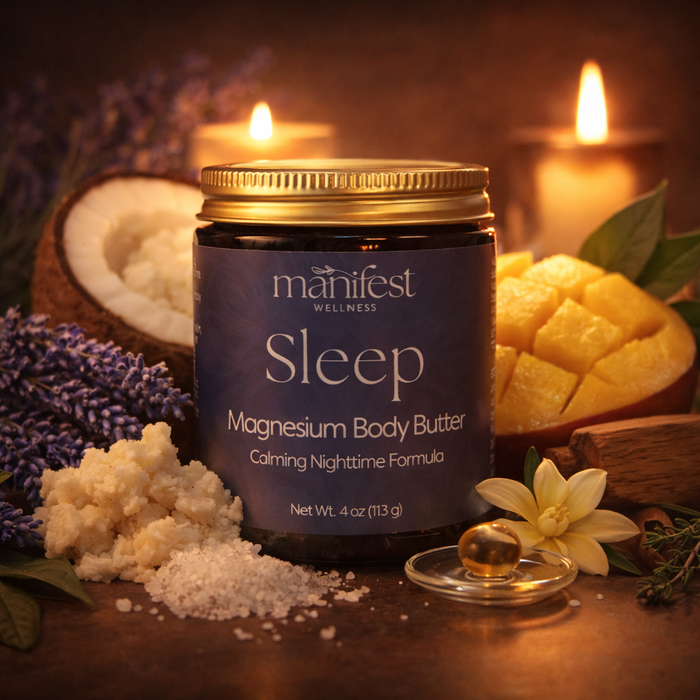 Magnesium sleep butter styled with lavender, coconut, mango, shea butter and softly glowing candles for a calming bedtime ritual.