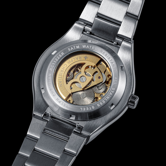 Silver Link Butterfly Band - Prague Deluxe showcasing a stainless steel case-back with visible gold-toned movement components and a brushed metal link bracelet, bold by design.