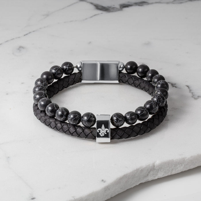 The Ambassador Bracelet - Silver features a double-wrap design with polished silver clasp, black braided leather, and marbled black beads showcasing bold men's jewelry by Ralph Christian.