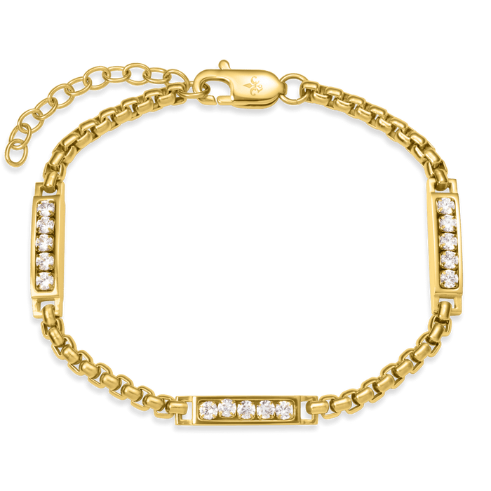 The Atlas Ice Bracelet in polished gold with three rectangular links each set with multiple cubic zirconia stones, featuring a sturdy gold chain and lobster clasp, bold by design.