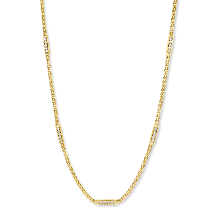 The Atlas Ice Necklace features a bold men's gold chain accented with rectangular cubic zirconia-set links, designed as a statement luxury jewelry piece.