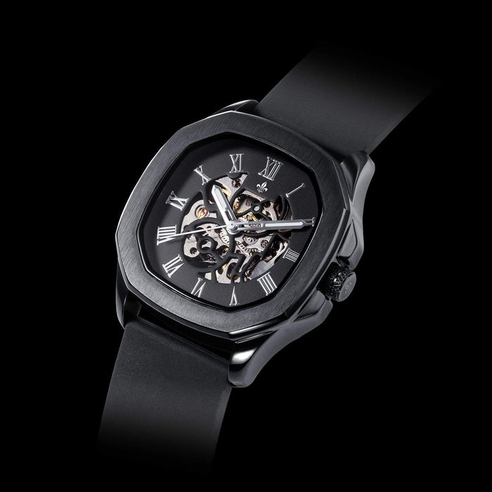 The Avalon - Black men's luxury watch featuring a bold black octagonal case, skeleton dial with Roman numerals, and a sleek black strap, designed to be noticed.