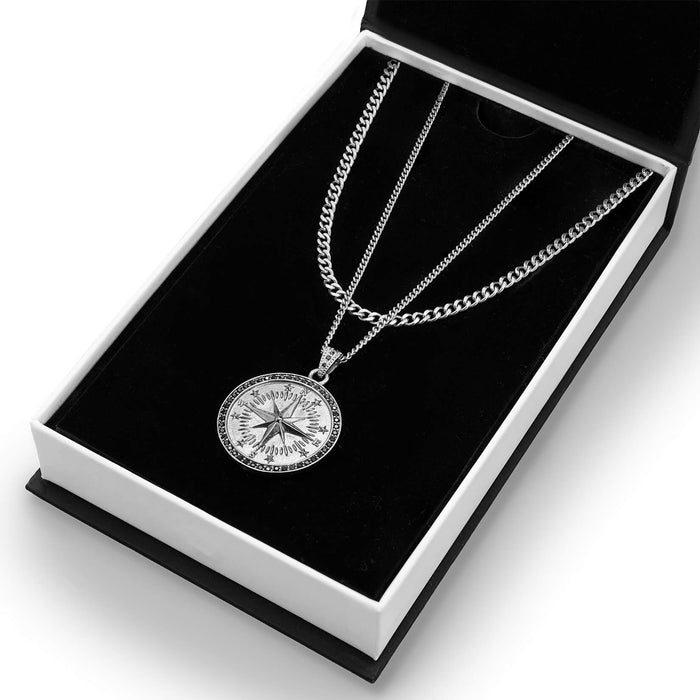 The Compass Essentials Bundle - Silver featuring two men's silver chains with a bold compass pendant, presented in a sleek black and white box, designed for standout style and statement luxury jewelry.