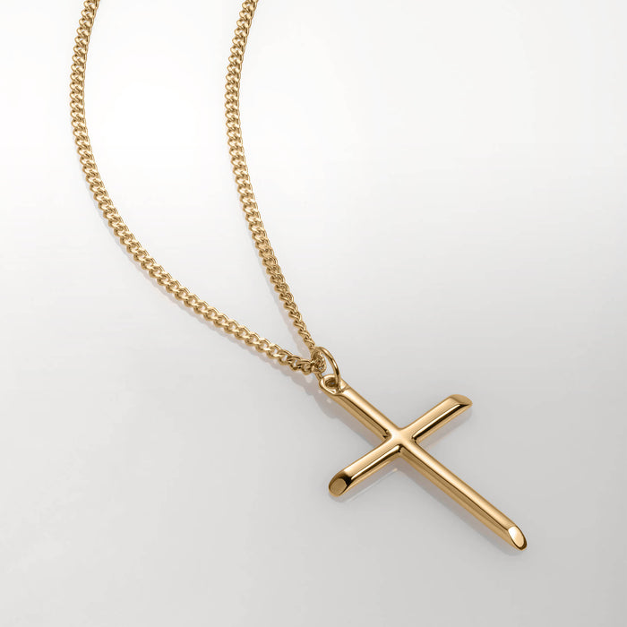 The Cross Essentials Bundle - Gold features a polished gold cross pendant on a matching gold chain, showcasing bold men's jewelry with a sleek, lightweight design from Ralph Christian. Bold by Design.