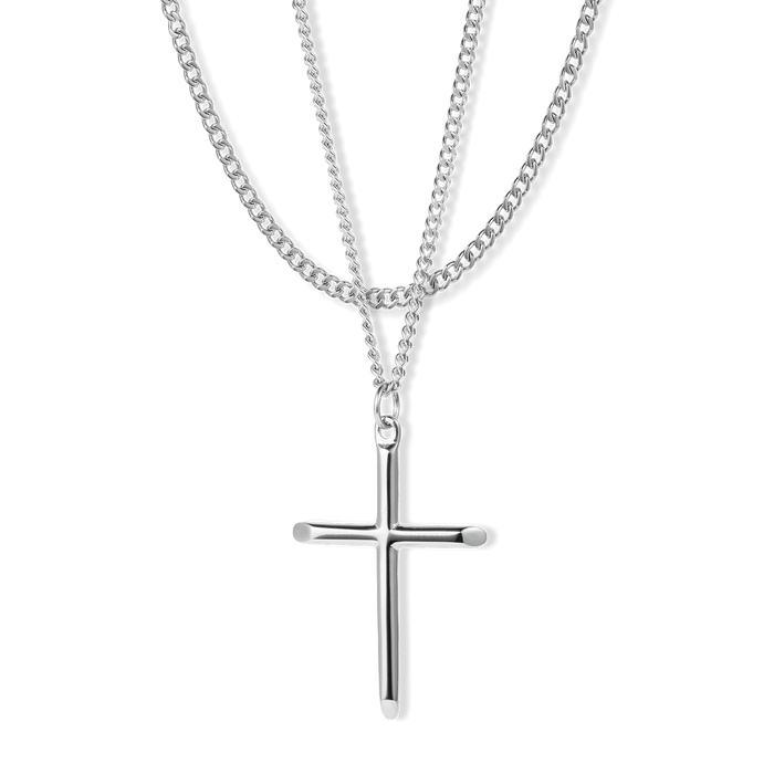The Cross Essentials Bundle - Silver features a polished silver cross pendant on a matching chain, designed as bold men's jewelry with a sleek and modern aesthetic.