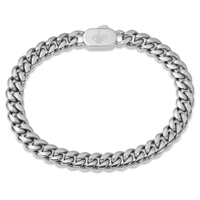 The Cuban Bracelet - Silver is a polished silver chain link men's jewelry piece featuring a bold, smooth clasp engraved with a fleur-de-lis, designed for a standout luxury look.