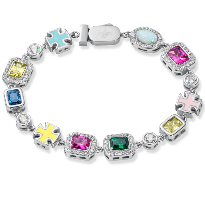 The Gemstone Bracelet featuring a silver-tone chain with colorful cubic zirconia stones in blue, yellow, pink, green, and opal-like accents, designed to be noticed.