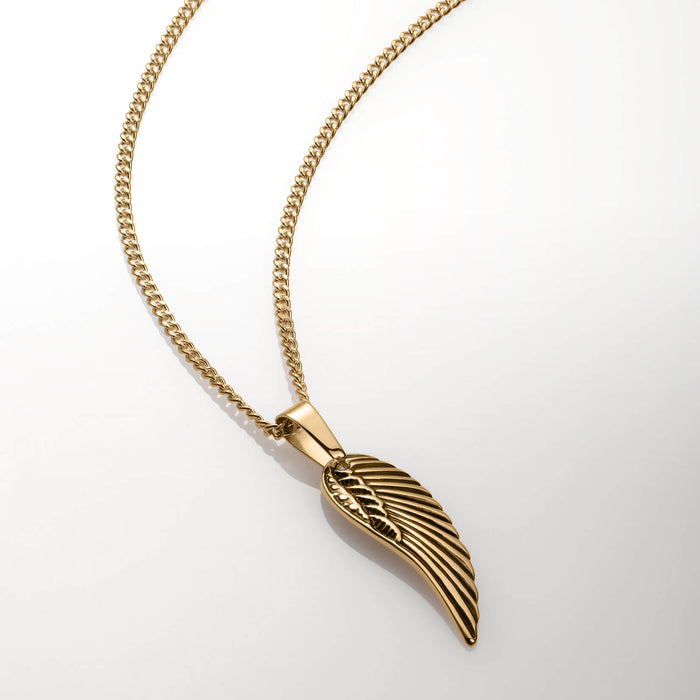 The Gold Wing Pendant - Essentials Collection features a bold gold wing-shaped pendant on a matching gold chain, designed to make a confident statement with men's jewelry.