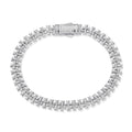 The Iced Creed Bracelet - Silver, a men's luxury jewelry piece featuring a bold silver tone with an intricate cross-link design and sparkling cubic zirconia accents, bold by design.