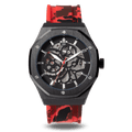 The Maverick STEEL - Camo Red men's luxury watch with a black steel case, skeleton dial exposing inner mechanics, and a bold red and black camo-patterned silicone strap.