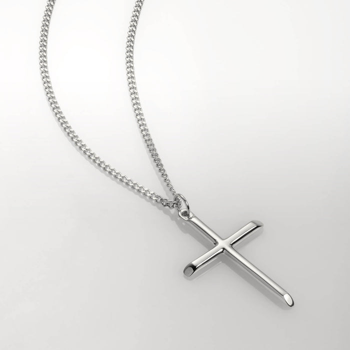 The Cross Essentials Bundle - Silver featuring a sleek, polished silver cross pendant on a matching bold silver chain, designed as a statement men's jewelry piece, bold by design.